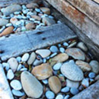Lucky River Pebbles with natural wood for visual impact