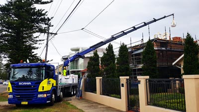 BC Sands 21 meter crane truck in action